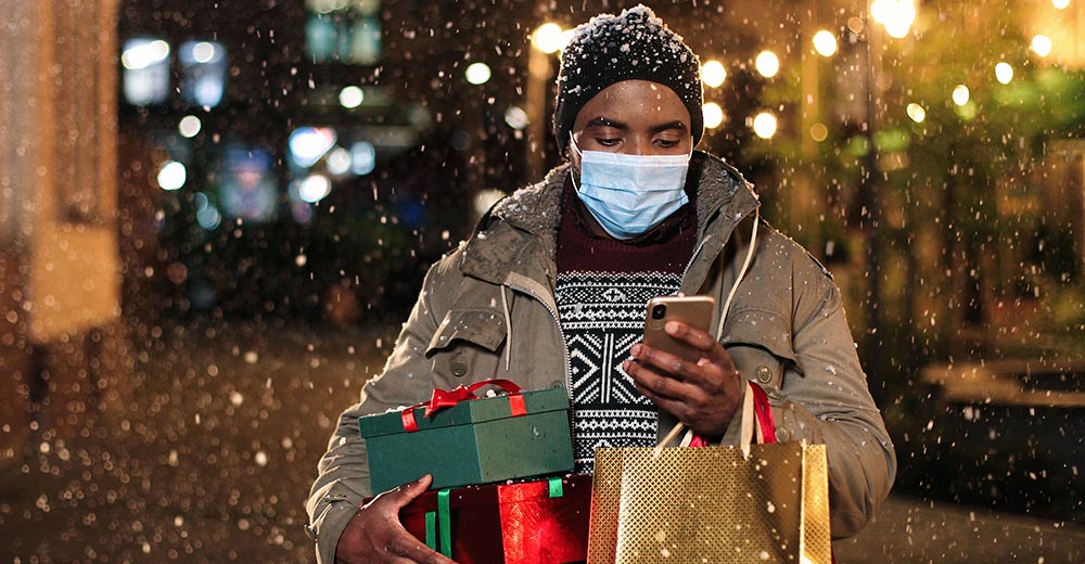 Holiday shopper with a protective face mask