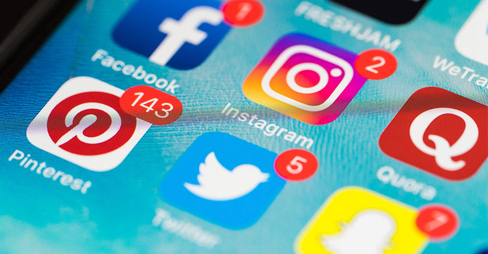 Social media apps Facebook, Pinterest, Instagram Twitter, Quora, Snapchat displayed on a smartphone